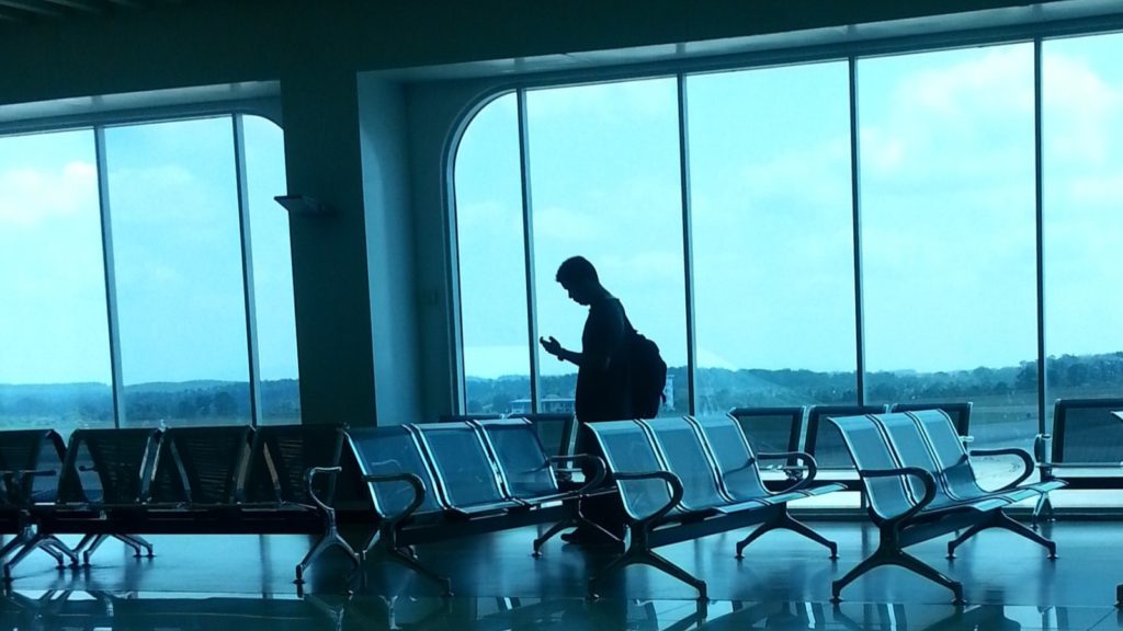 Person Waiting at Airport